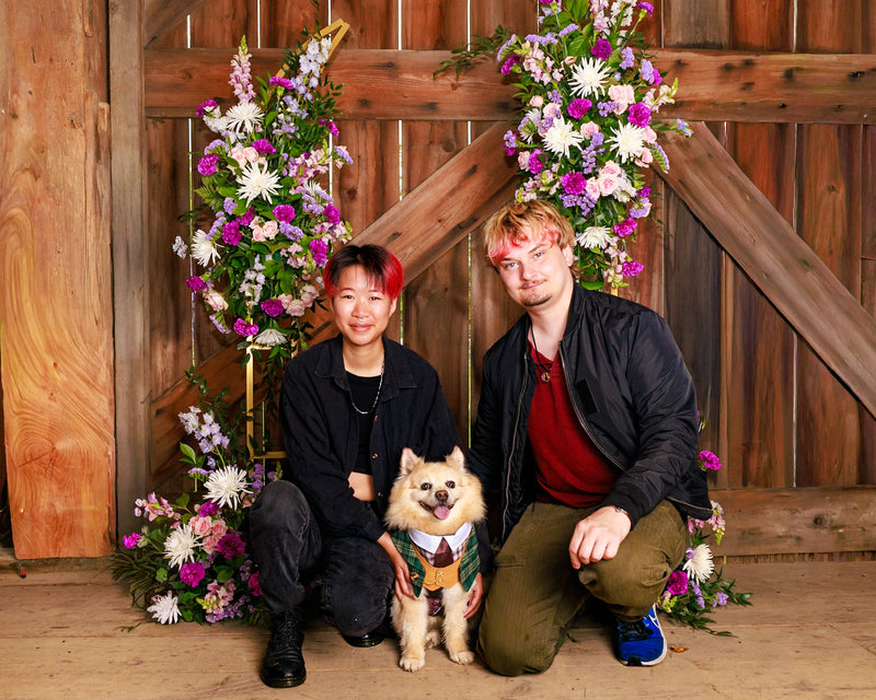 Studio portrait with vibrant floral styling
